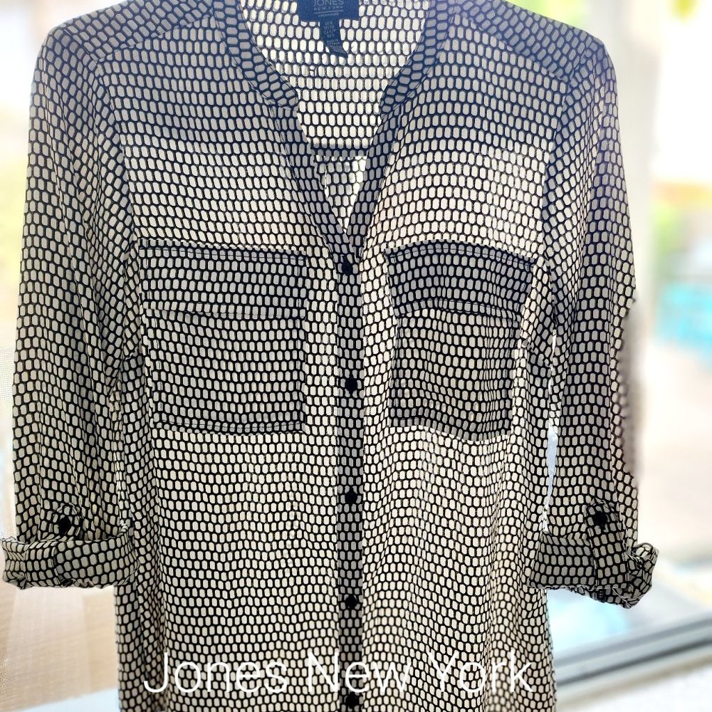 Black and white patterned button up V neck shirt